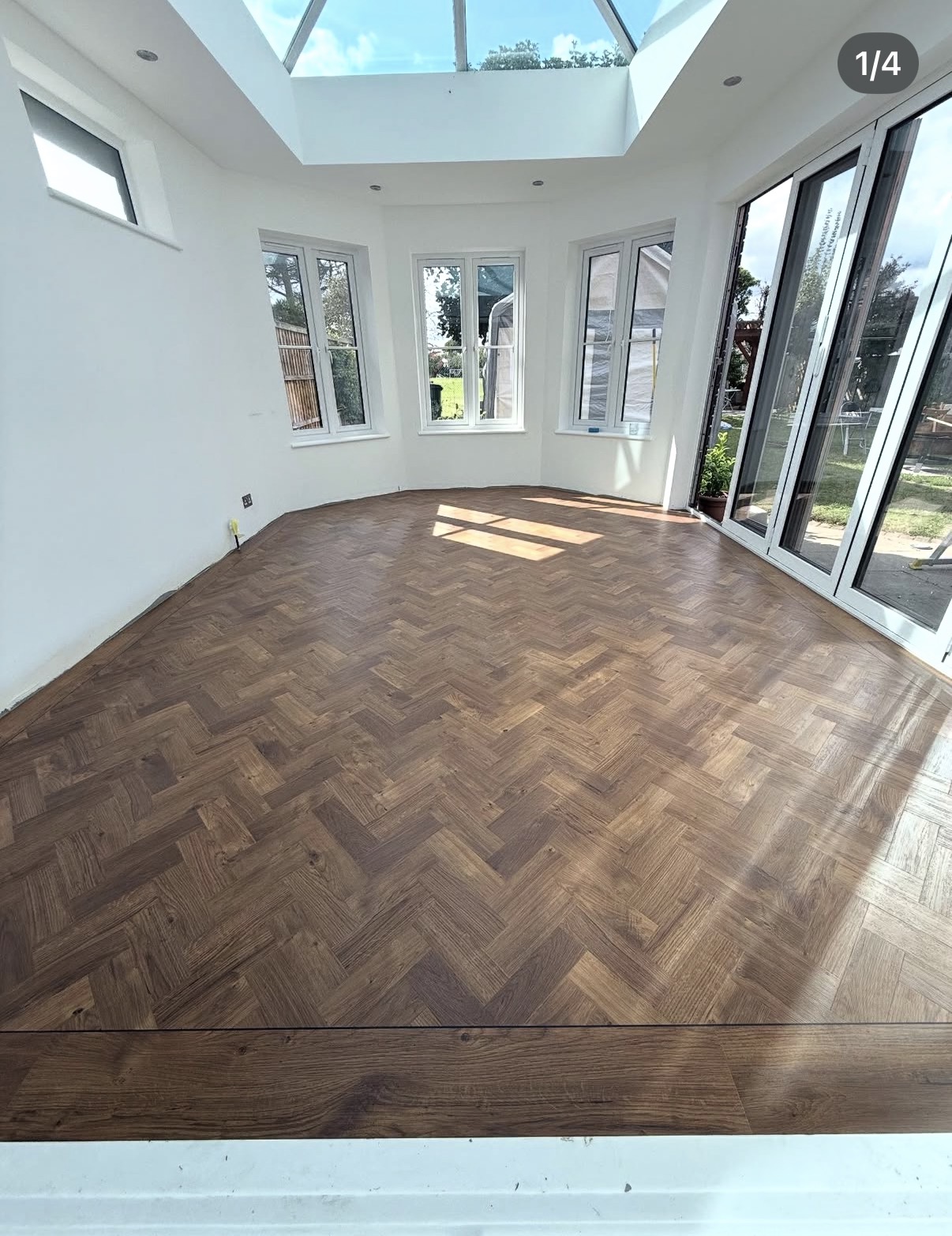 Dark oak herringbone conservatory floor